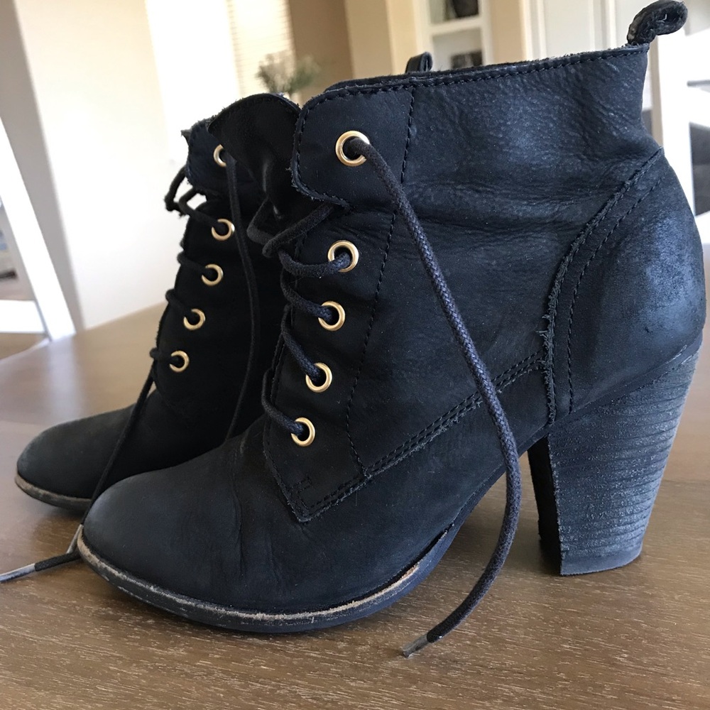 Steve Madden heeled black combat boots